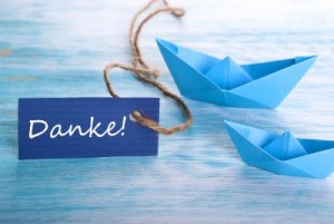 Label with Danke and a Boat